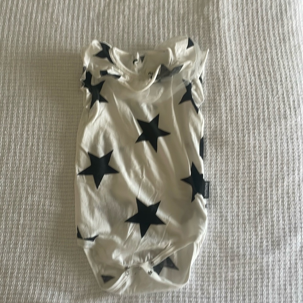 Nununu white with black star, ruffle neck, trim, onesie. Size 12-18M